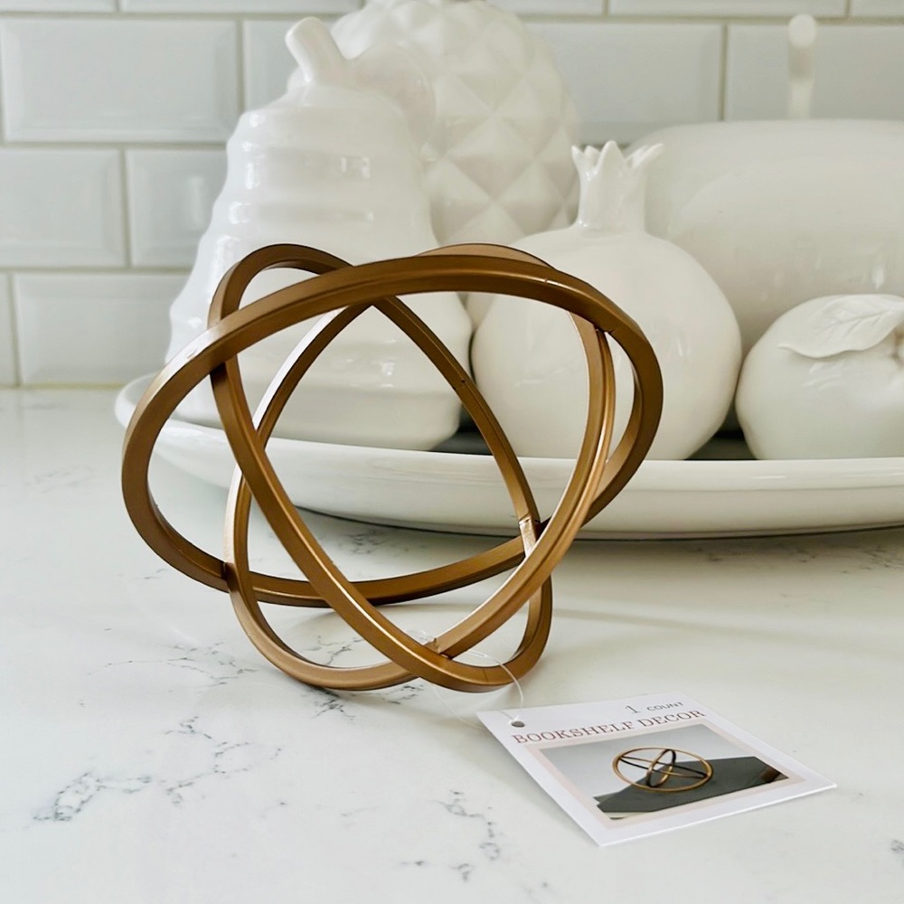 Target Bullseye’s Metal Orbit Bookshelf Decor